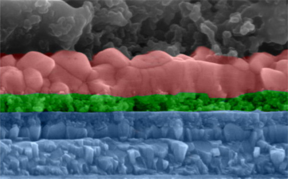 An electron microscope image showing a cross-section of the cell developed at Rice. The layers are, from top, a carbon electrode, perovskite, titanium oxide, fluorine-doped tin oxide and glass. The scale bar equals 500 nanometers. Image Courtesy of the Lou Group Image Courtesy of the Lou Group