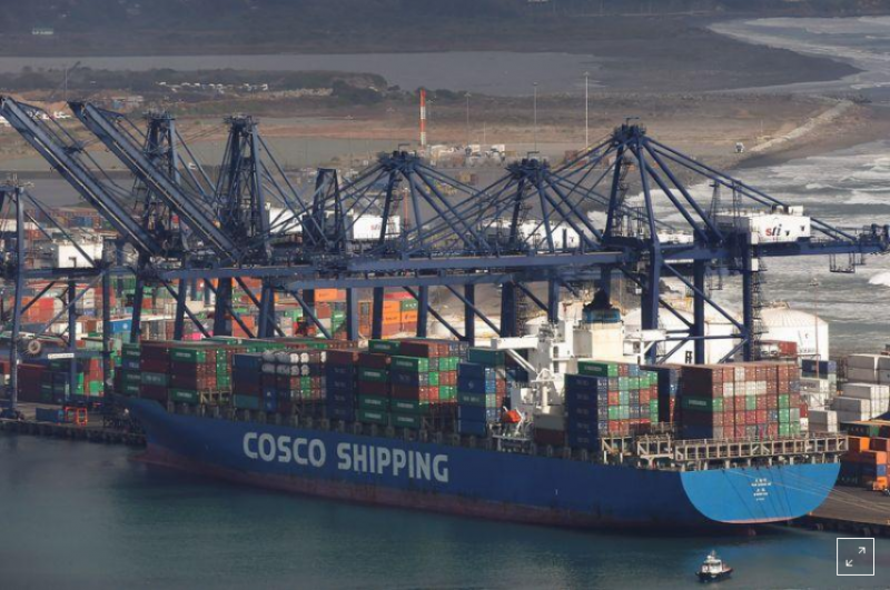 FILE PHOTO: A China Ocean Shipping Company (COSCO) container ship is seen at the San Antonio port in Chile August 6, 2019. REUTERS/Rodrigo Garrido